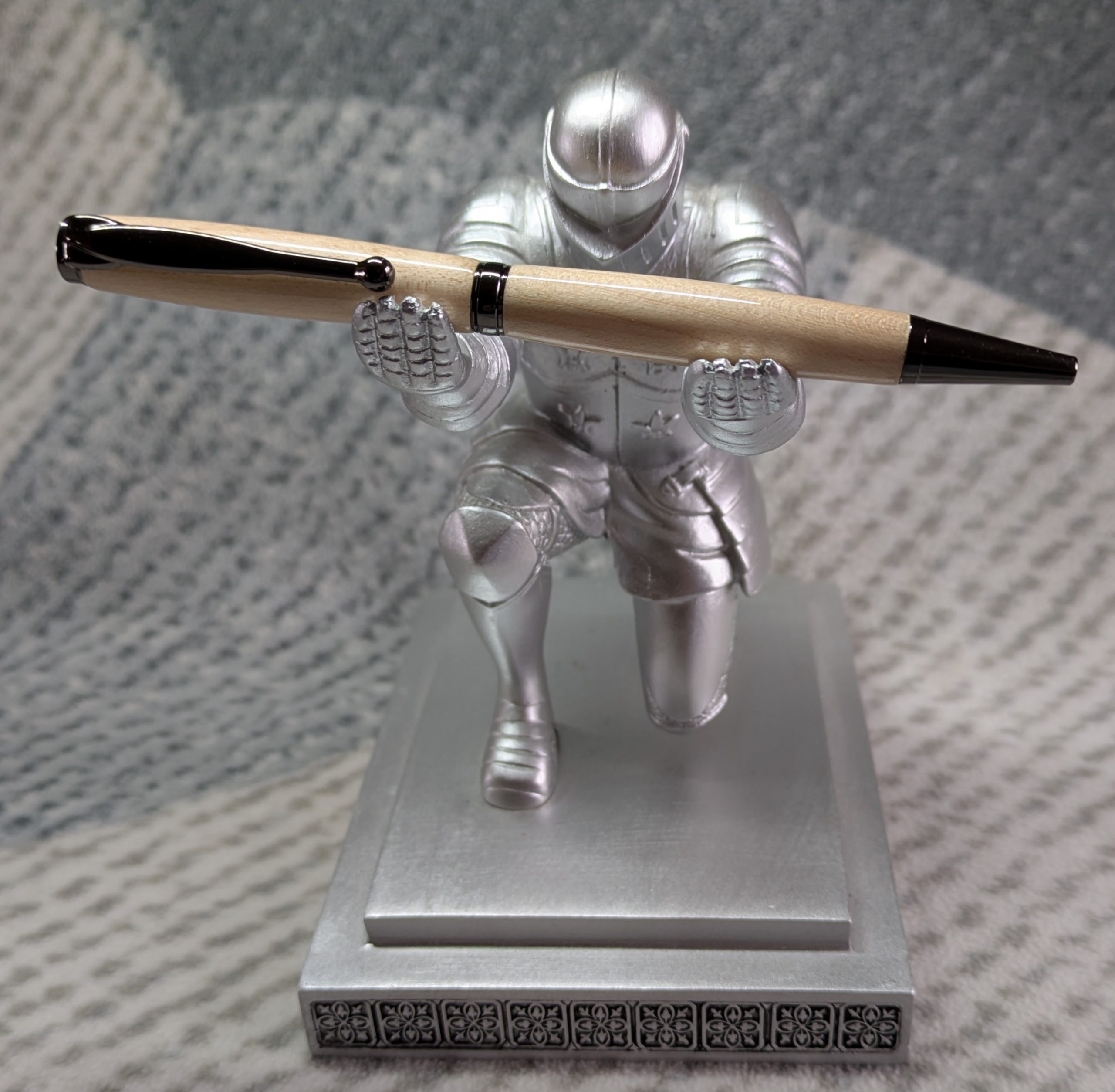 Slimline twist ballpoint pen made from maple with gun metal fittings