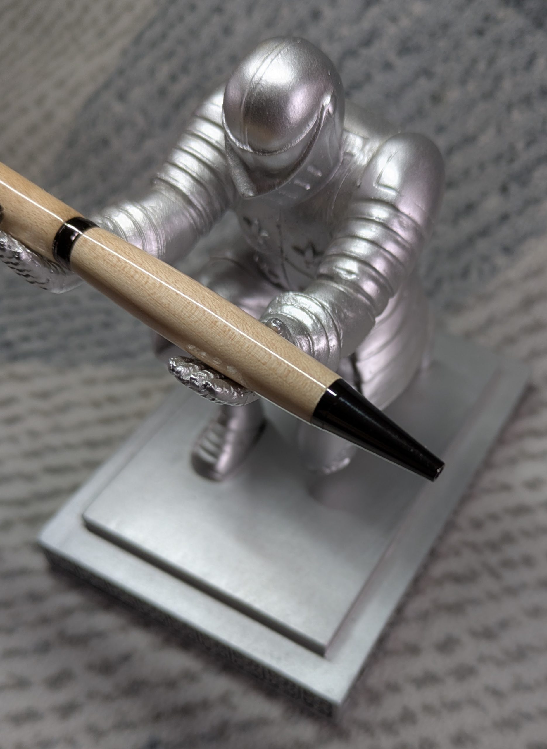 Slimline twist ballpoint pen made from maple with gun metal fittings