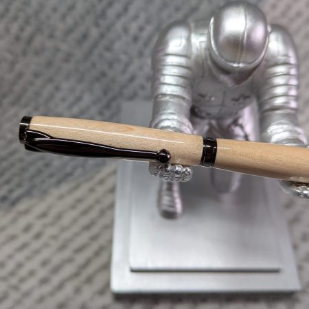 Slimline twist ballpoint pen made from maple with gun metal fittings