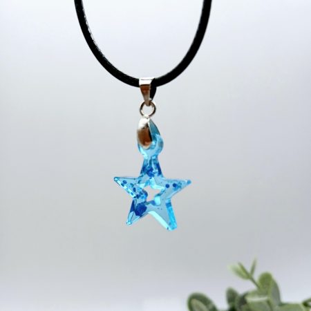 Blue Glitter Star Resin pendant on black cord