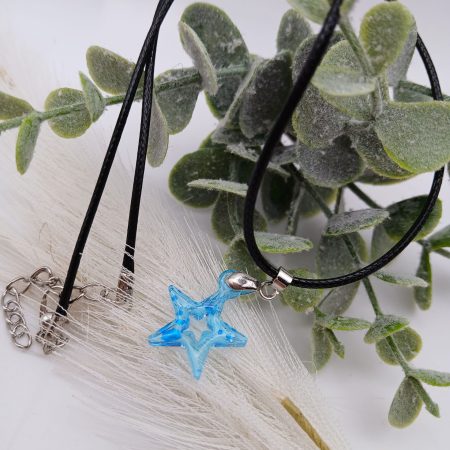 Blue Glitter Star Resin pendant on black cord