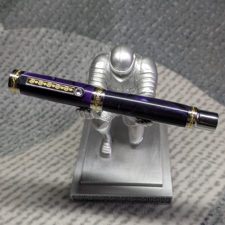 Hand turned Empress style rollerball pen in shimmering purple with gold and chrome fittings