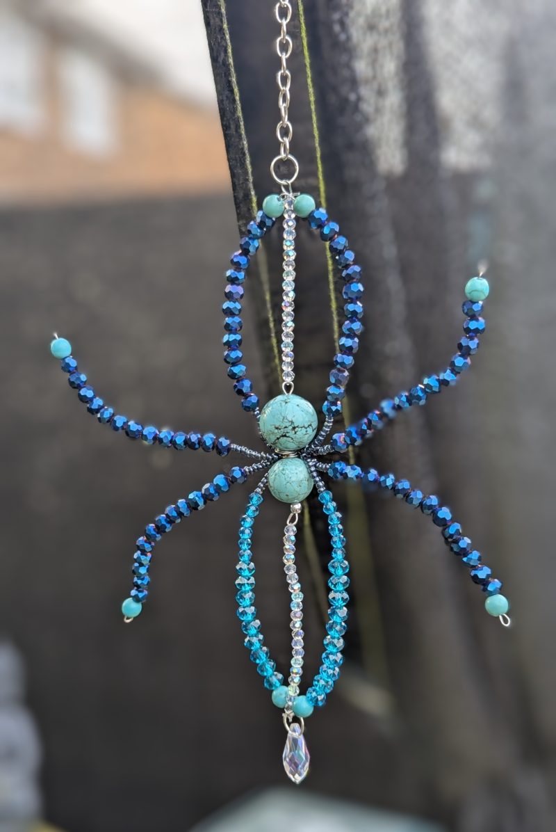 The Sapphire Weaver – Hand-crafted Celestial Spider Amulet