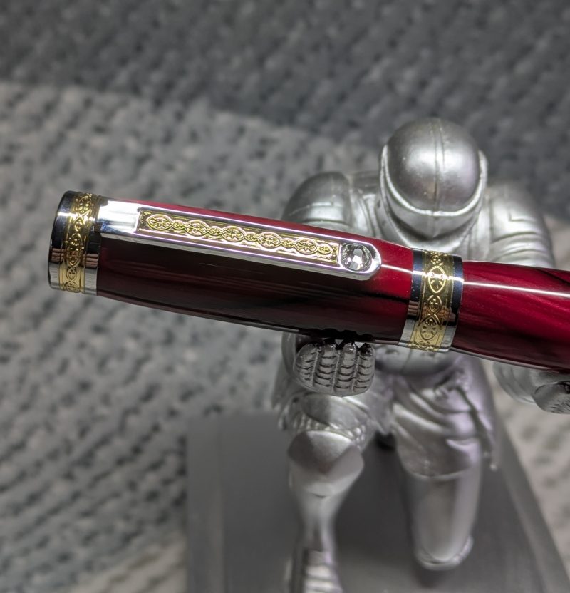 Hand turned Empress style rollerball pen in shimmering red acrylic