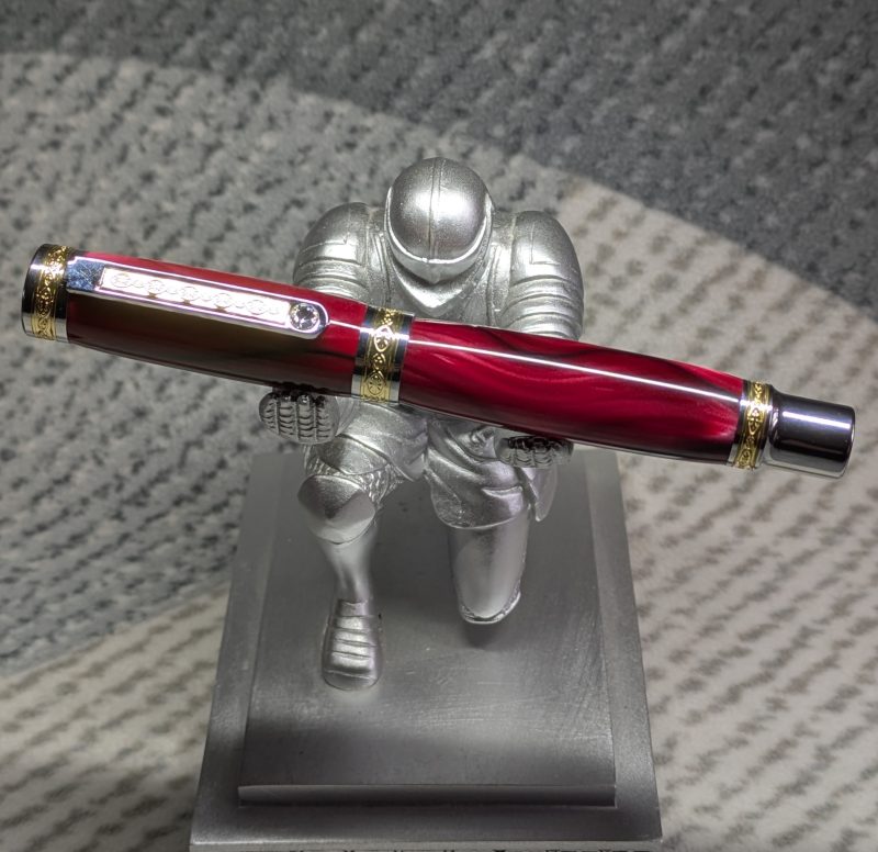 Hand turned Empress style rollerball pen in shimmering red acrylic