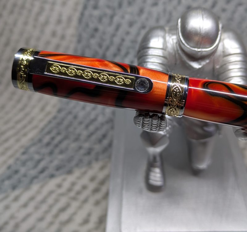 Hand turned Empress style rollerball pen in shimmering orange acrylic
