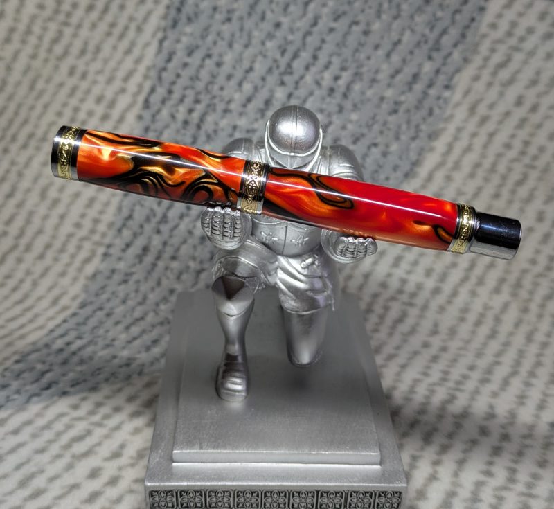 Hand turned Empress style rollerball pen in shimmering orange acrylic