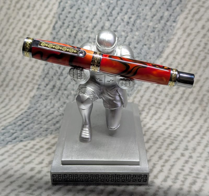 Hand turned Empress style rollerball pen in shimmering orange acrylic