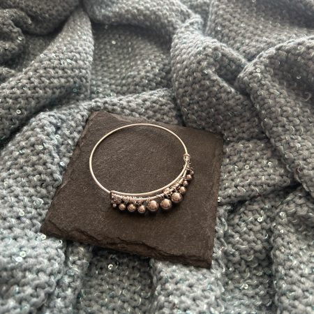 Silver plated and stainless steel drop ball bangle