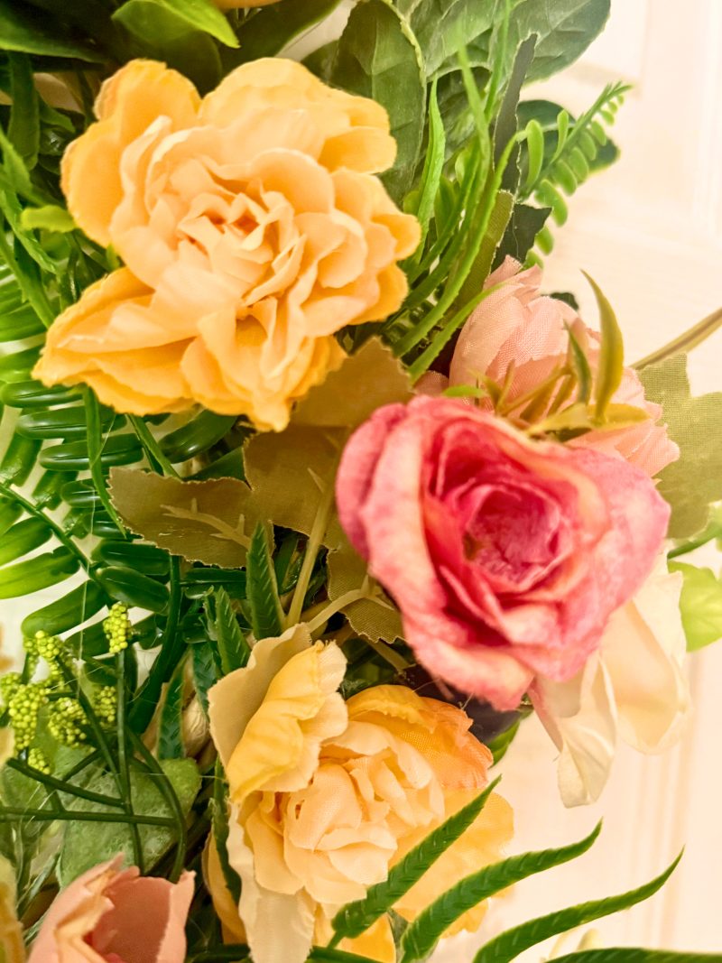 SOLD - A unique, vintage-style wreath with soft pastel flowers and green foliage, 40cm diameter.