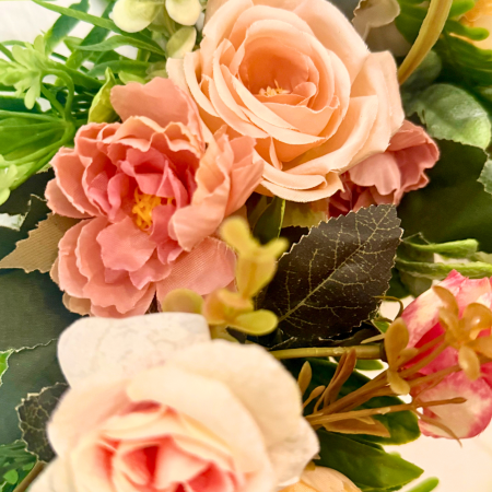 SOLD - A unique, vintage-style wreath with soft pastel flowers and green foliage, 40cm diameter.