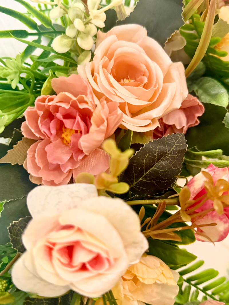 SOLD - A unique, vintage-style wreath with soft pastel flowers and green foliage, 40cm diameter.