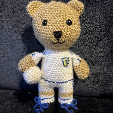 Crocheted football or rugby bear
