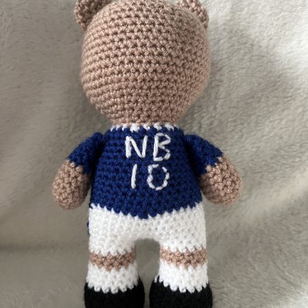 Crocheted football or rugby bear