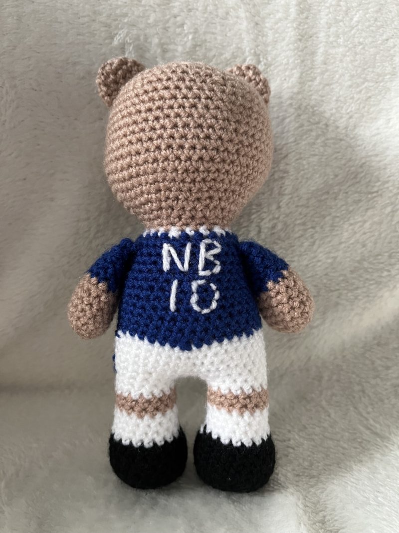 Crocheted football or rugby bear