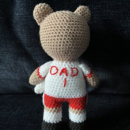 Crocheted football or rugby bear