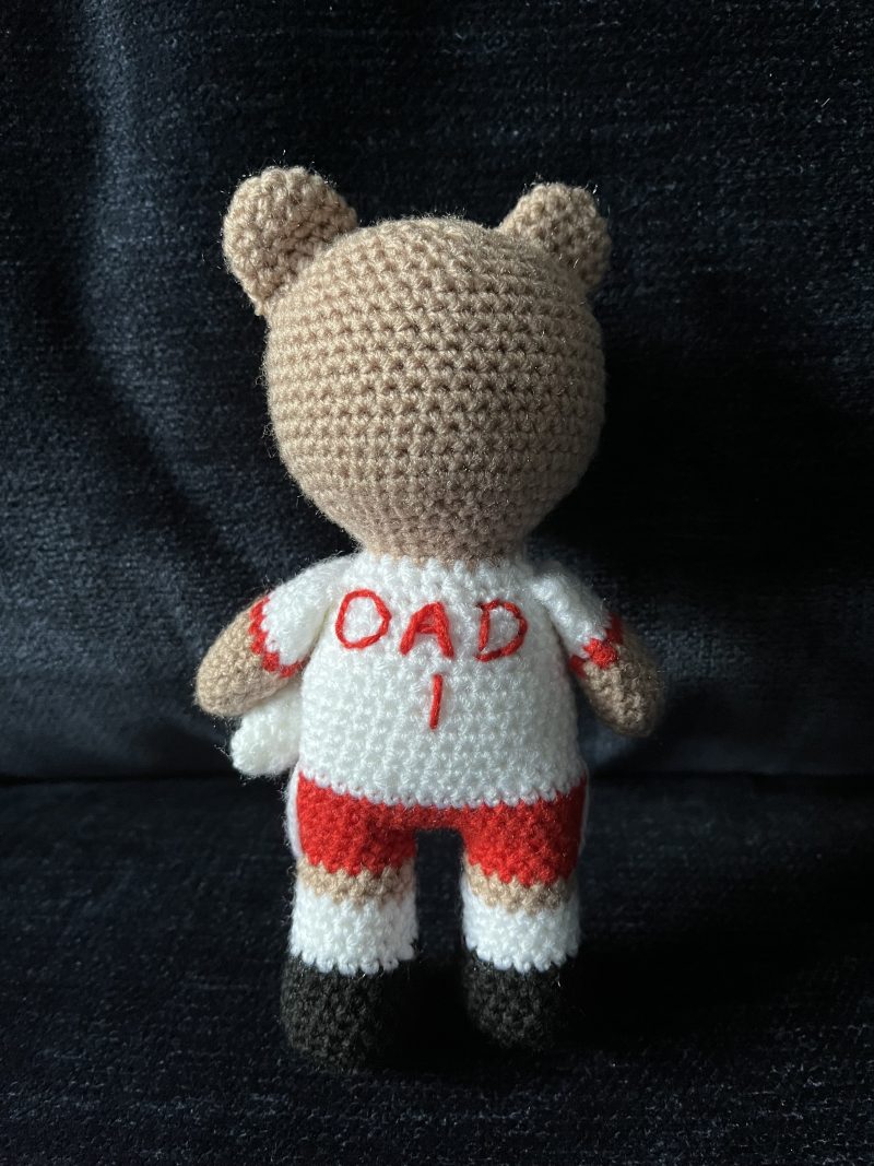 Crocheted football or rugby bear