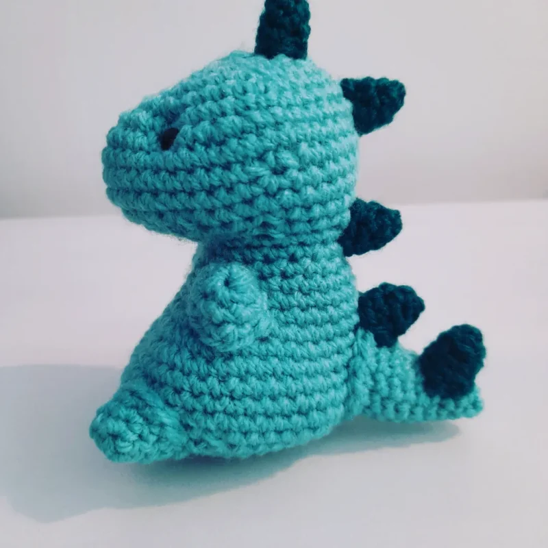 Crocheted dinosaur plushie