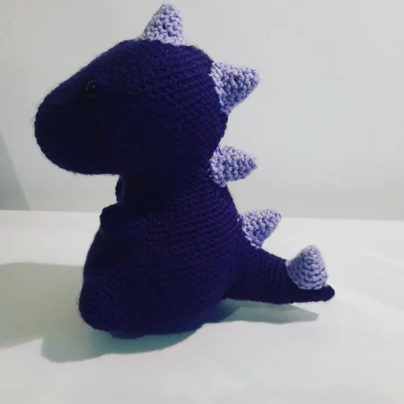 Crocheted dinosaur plushie