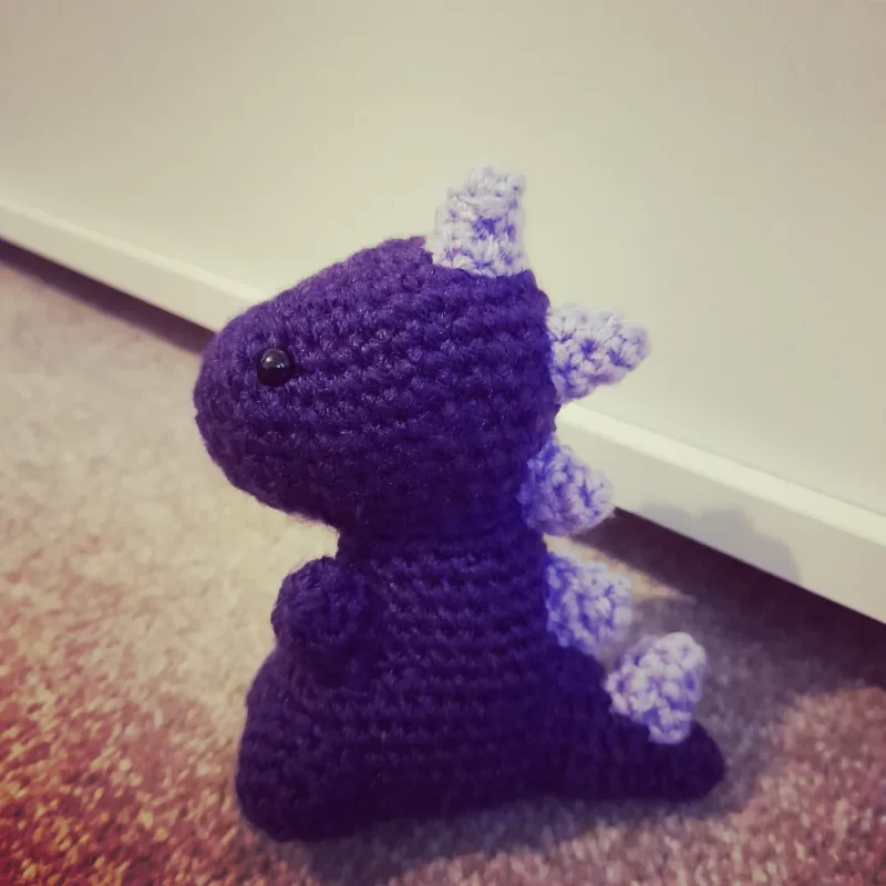 Crocheted dinosaur plushie