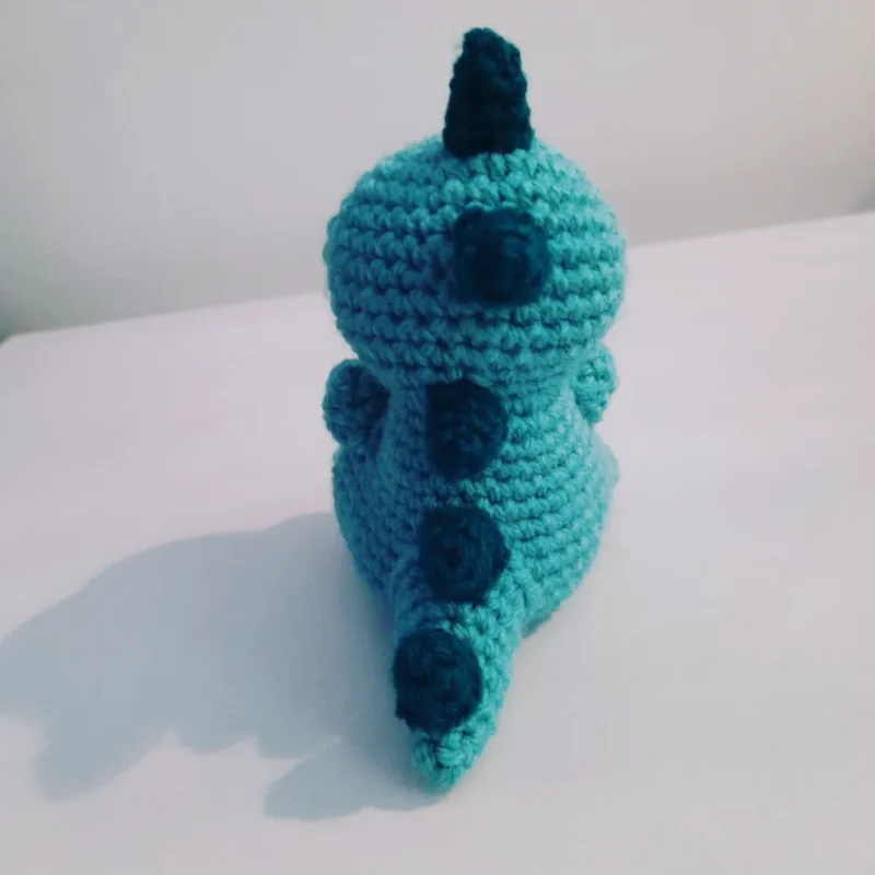 Crocheted dinosaur plushie