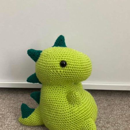 Crocheted dinosaur plushie