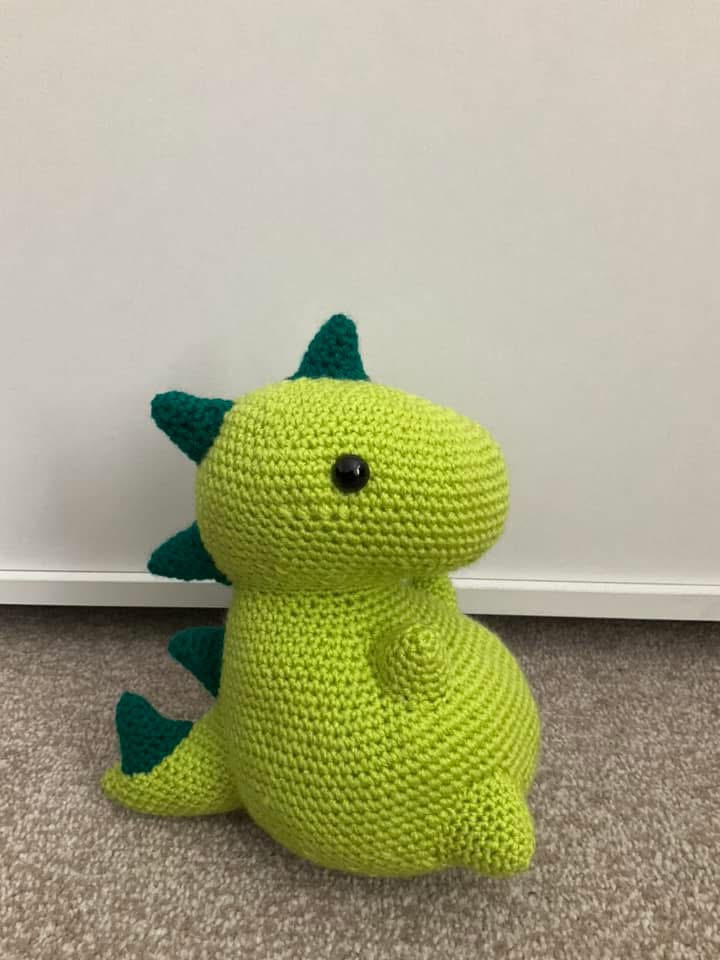 Crocheted dinosaur plushie