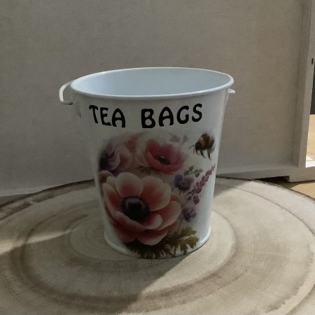 Decoupaged tea bag bucket with floral and bee design