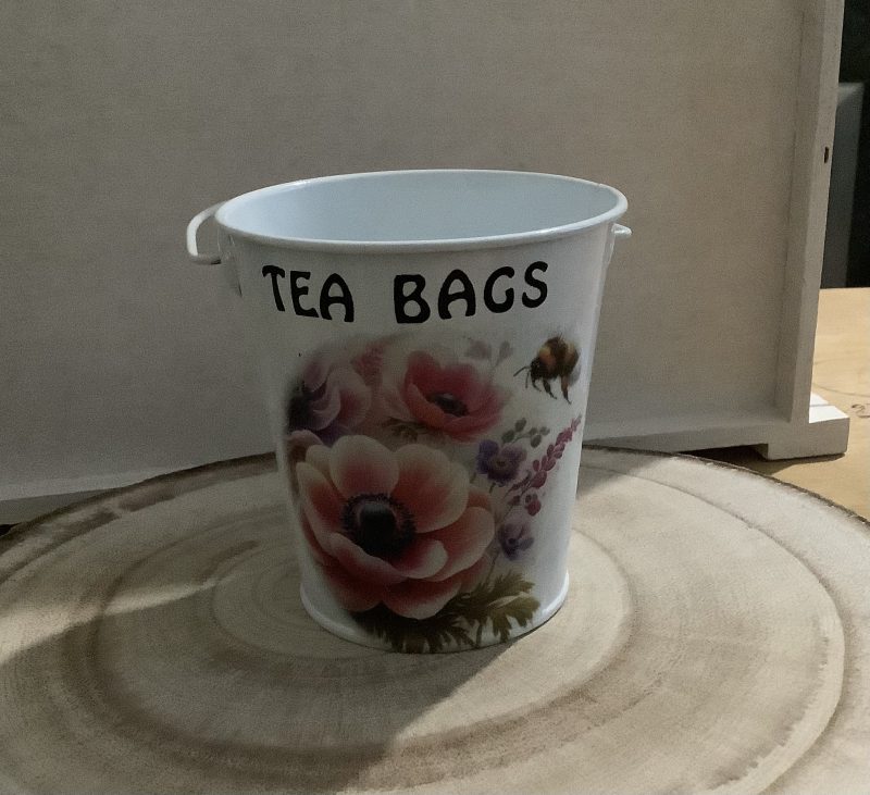 Decoupaged tea bag bucket with floral and bee design