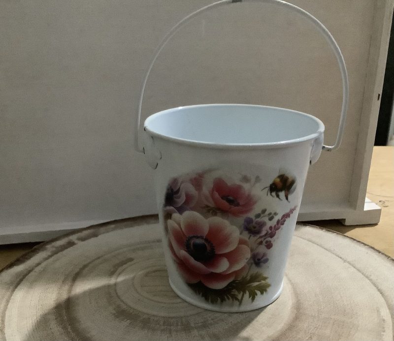 Decoupaged tea bag bucket with floral and bee design