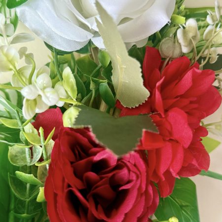 40cm Red and White Artificial Flower Wreath with Green Foliage on a Rattan base