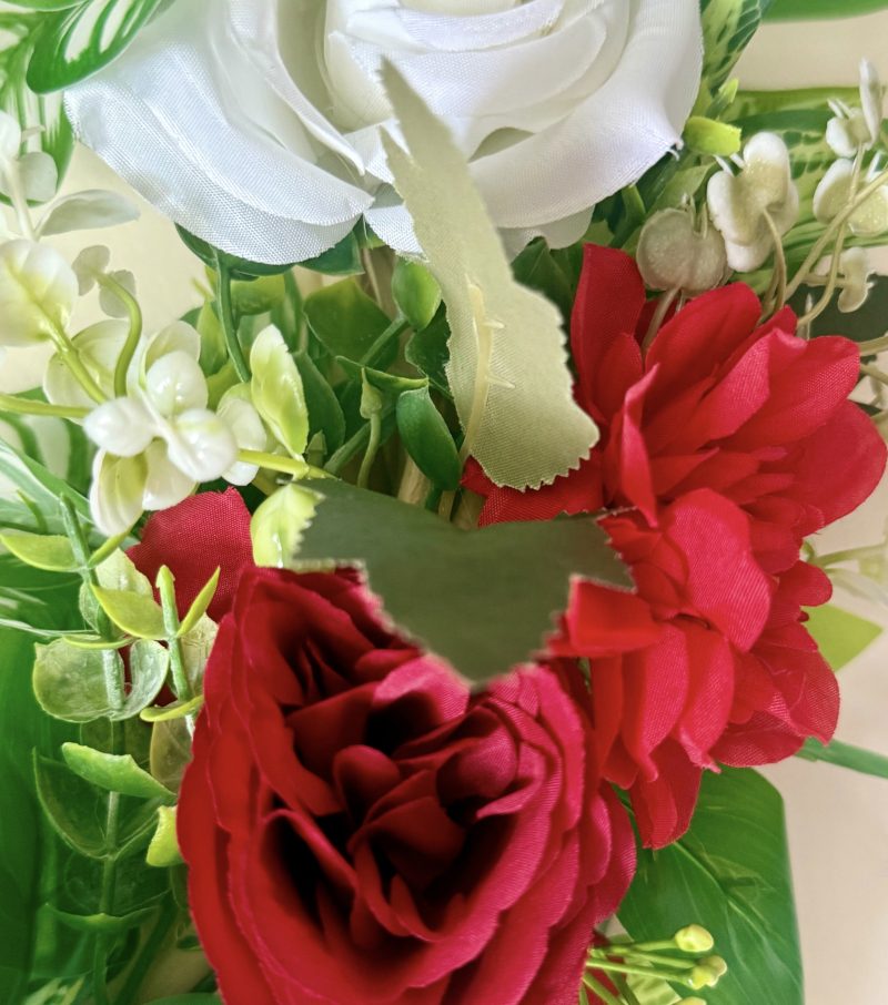 40cm Red and White Artificial Flower Wreath with Green Foliage on a Rattan base