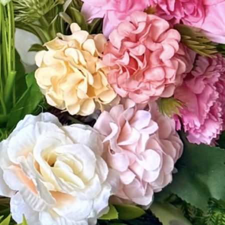 Handmade wreath in soft pinks with green leaves, perfect for summer decoration. Size 55cm