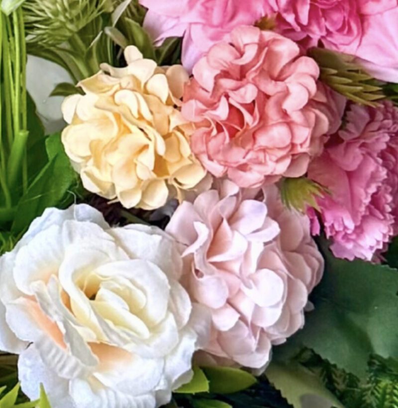 Handmade wreath in soft pinks with green leaves, perfect for summer decoration. Size 55cm