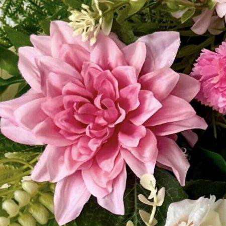 Handmade wreath in soft pinks with green leaves, perfect for summer decoration. Size 55cm
