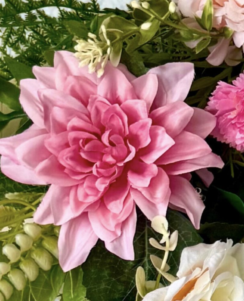 Handmade wreath in soft pinks with green leaves, perfect for summer decoration. Size 55cm