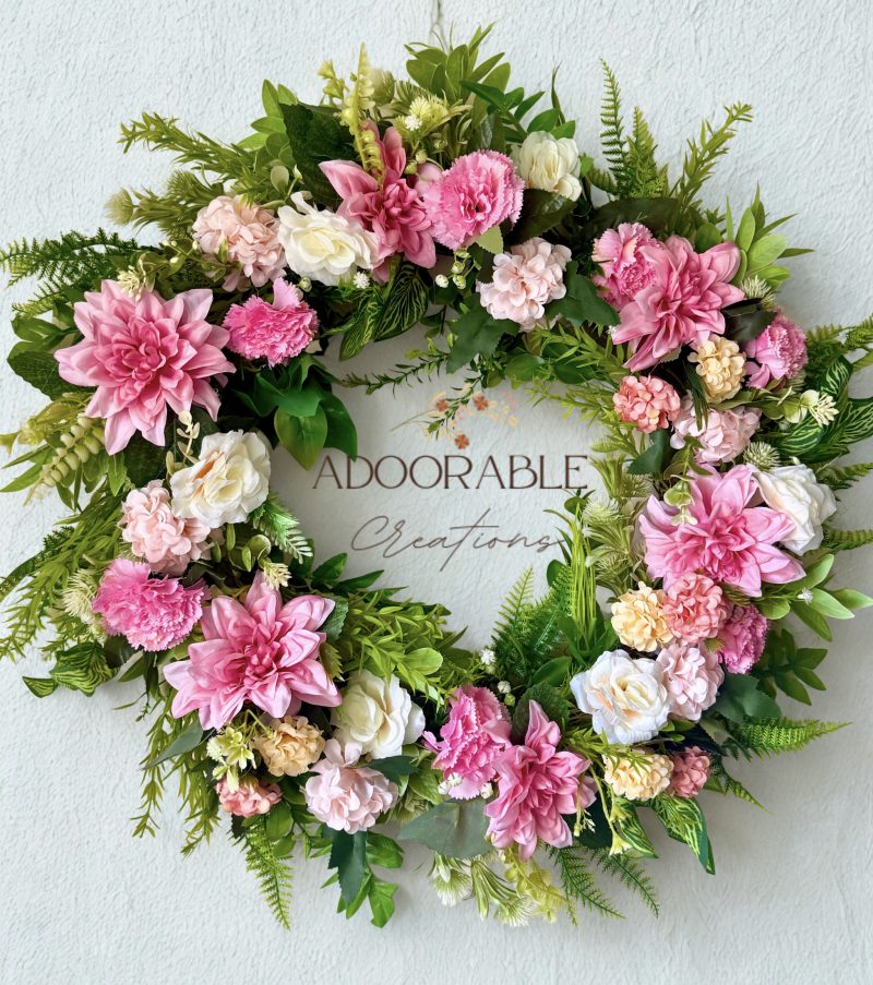 Handmade wreath in soft pinks with green leaves, perfect for summer decoration. Size 55cm