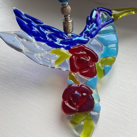 Fused glass hummingbird with rose detail