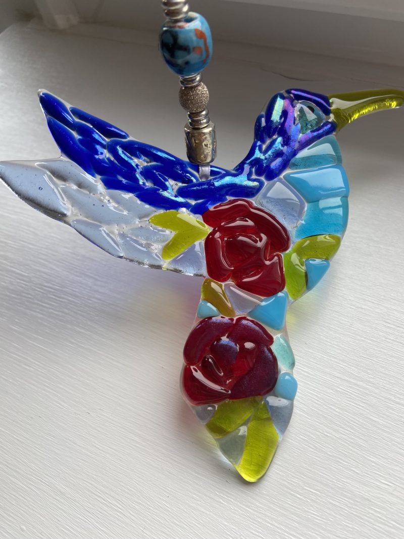 Fused glass hummingbird with rose detail