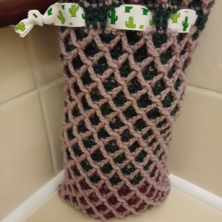 Crocheted wool drawstring bag.