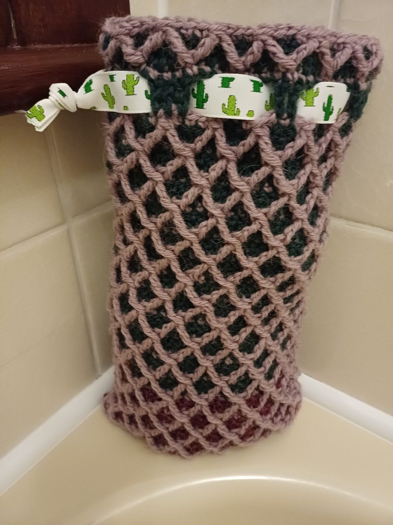 Crocheted wool drawstring bag.
