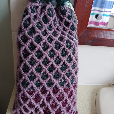 Crocheted wool drawstring bag.