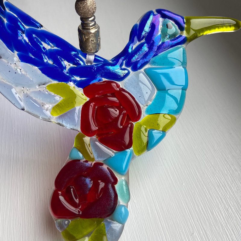 Fused glass hummingbird with rose detail