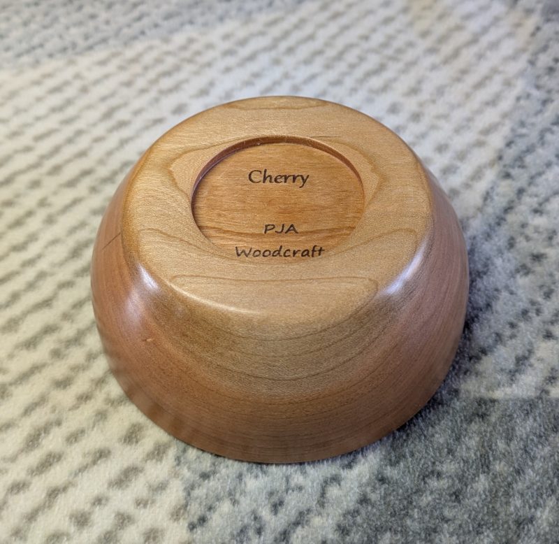 Hand turned bowl made from cherry wood with a gloss finish