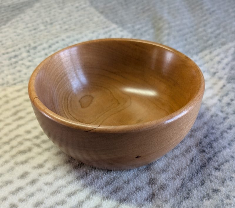 Hand turned bowl made from cherry wood with a gloss finish