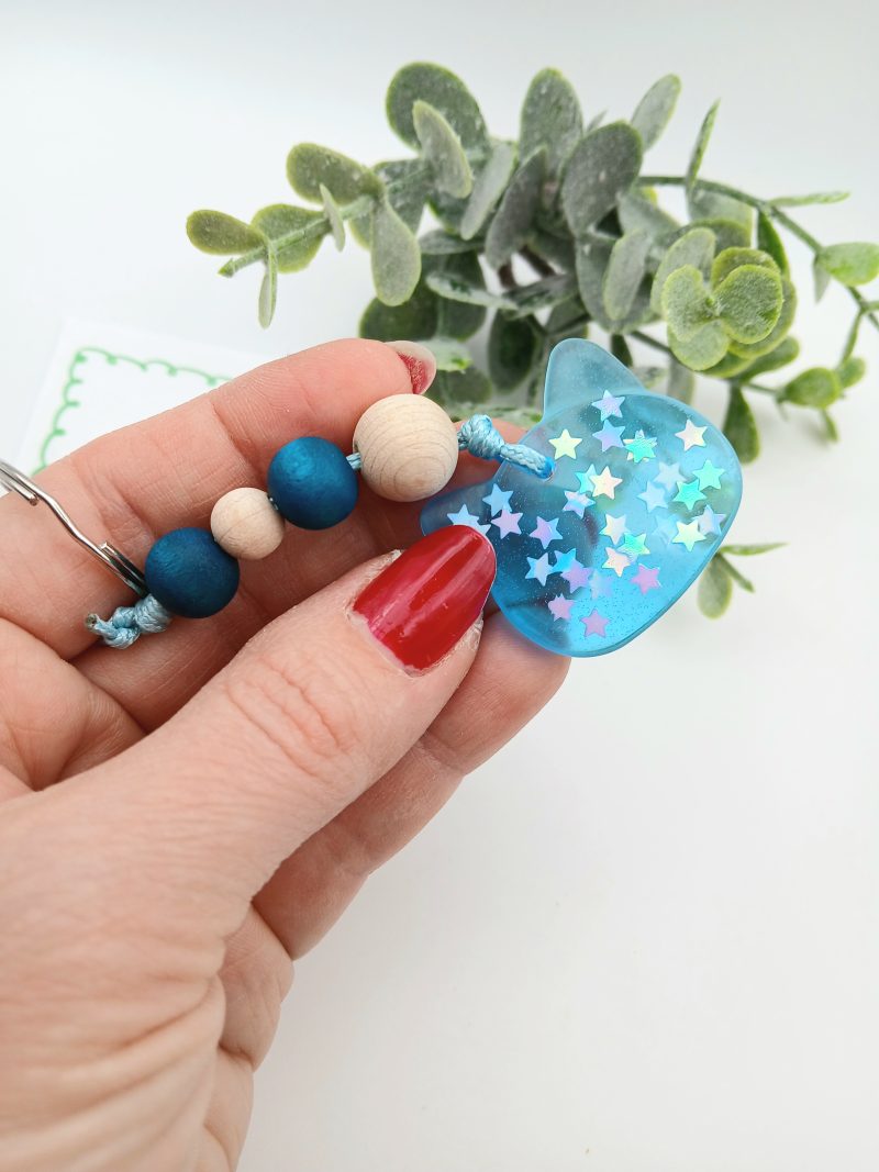 Handmade Blue Resin with stars Cat charm on keyring with wooden beads