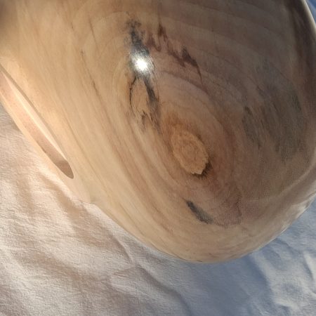 Decoratively shaped round bowl in natural spalted white poplar wood.