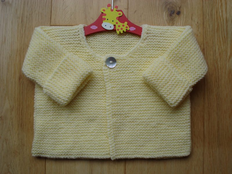 Pretty Hand Knitted Lemon Yellow Cardigan With One Pearl Button