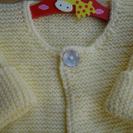Pretty Hand Knitted Lemon Yellow Cardigan With One Pearl Button