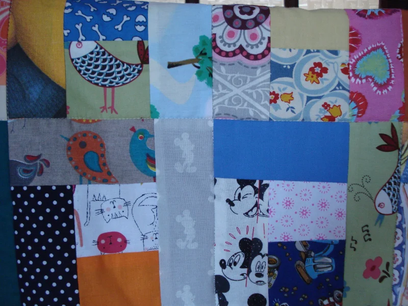 Handmade Quilt / Play Mat Multi Colours And Prints With A Navy Blue Backing